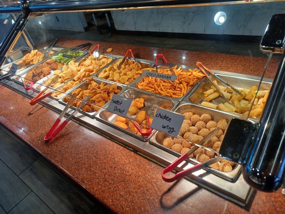 Family-friendly restaurant interior with simple tables.